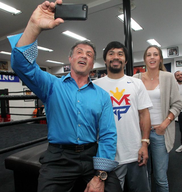 Sylvester Stallone snaps a selfie with Pacquiao. Photo by Chris Farina - Top Rank 