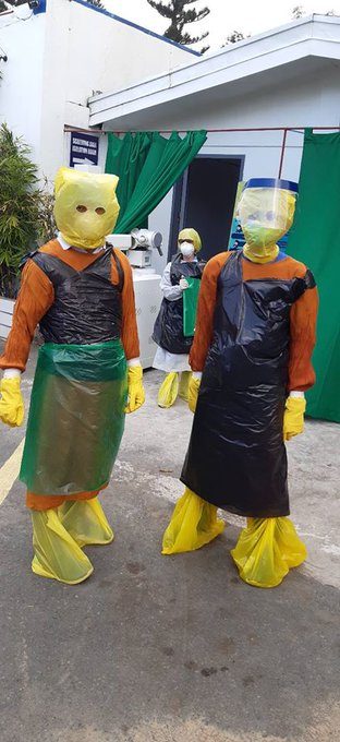 DO-IT-YOURSELF. Frontliners from St. Jude Family Hospital in Los Baños, Laguna use plastic bags and recyclable plastic containers as improvised PPE. Photo by Tes Depano. 