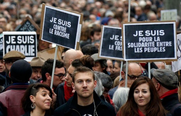 SHOW OF FORCE. Thousands of people walk and hold banners reading 'I am Charlie' during a tribute to the victims of the January  7 attack on the Paris headquarters of French satirical magazine Charlie Hebdo, in Toulouse, Southern France, January 10, 2014. Guillaume Horcajuelo/EPA