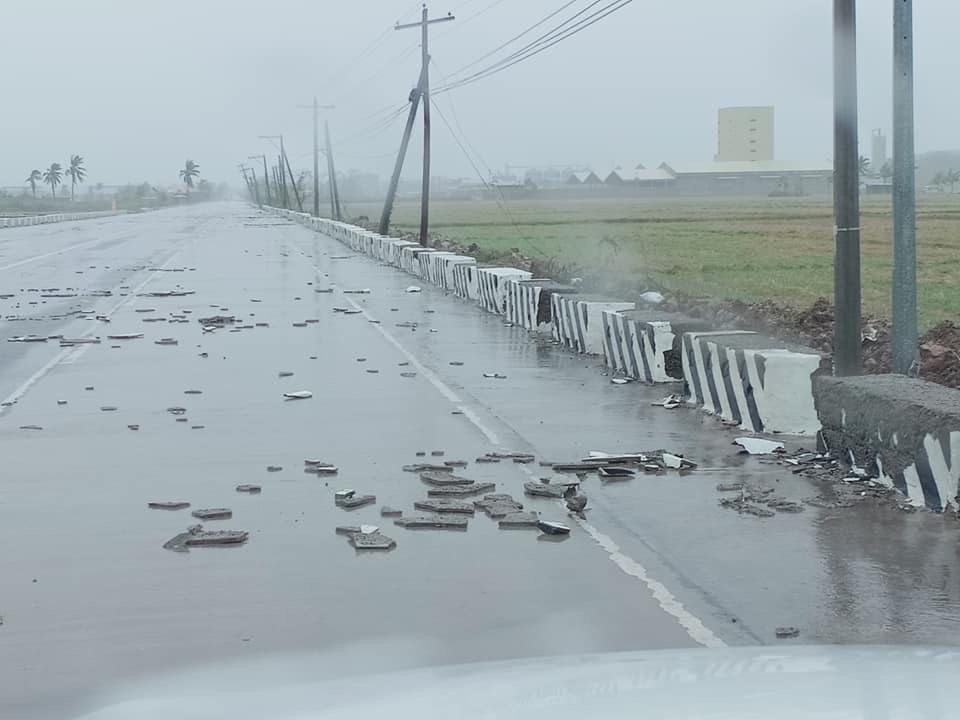 DEBRIS. Concrete fragments are scattered along a highway in the municipality of Alicia. Photo by MDRRMC Alicia 