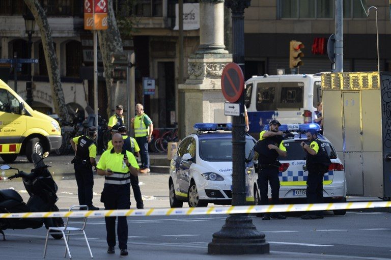 13 dead, 100 injured in 2 Spanish seaside city attacks