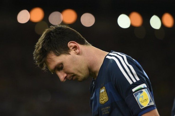 DEJECTED. Argentina's forward and captain Lionel Messi reacts after losing the 2014 FIFA World Cup final football match between Germany and Argentina 1-0 following extra-time at the Maracana Stadium in Rio de Janeiro, Brazil, on July 13, 2014. Fabrice Coffrini/AFP
