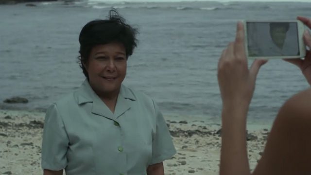 HAUNTED IN PARADISE. Nora Aunor’s Mara strikes a pose by one of Batanes’ rocky beaches (Screengrab courtesy of YouTube) 