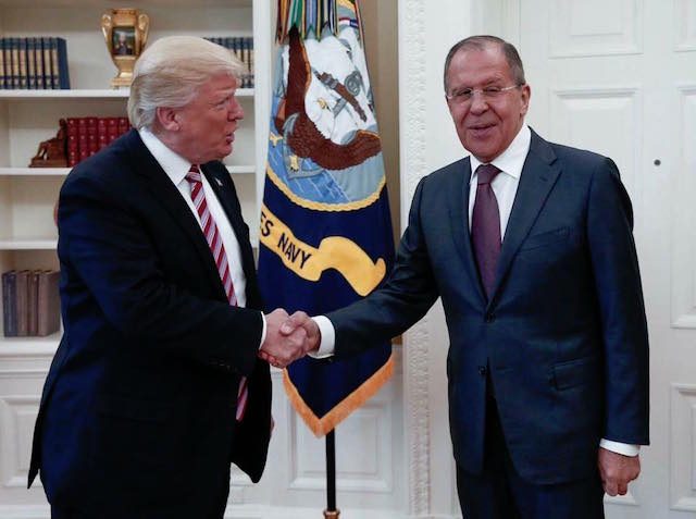White House fumes after Moscow releases Trump meeting photos