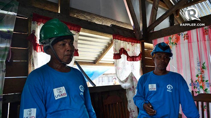 FARMERS TO CARPENTERS. Two former coconut farmers are now trained carpenters under PLAN International's program. 