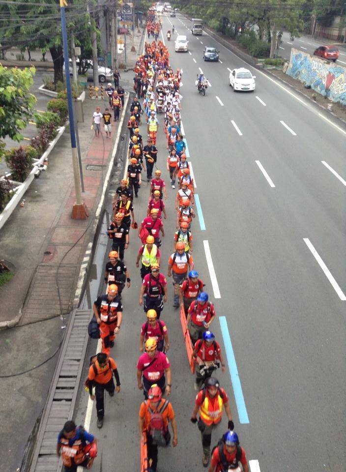 SINGLE LINE. Rescuers march from BGC in Taguig to the Quezon Circle in the 2014 Rescue M.A.R.C.H. 