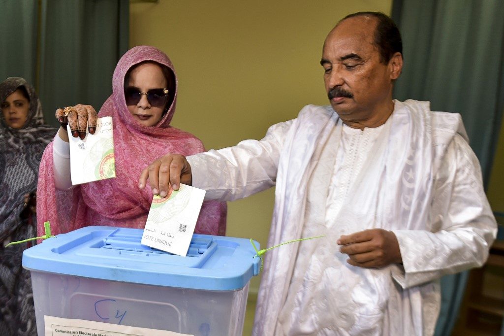 Mauritania votes after low-key campaign on economy and stability