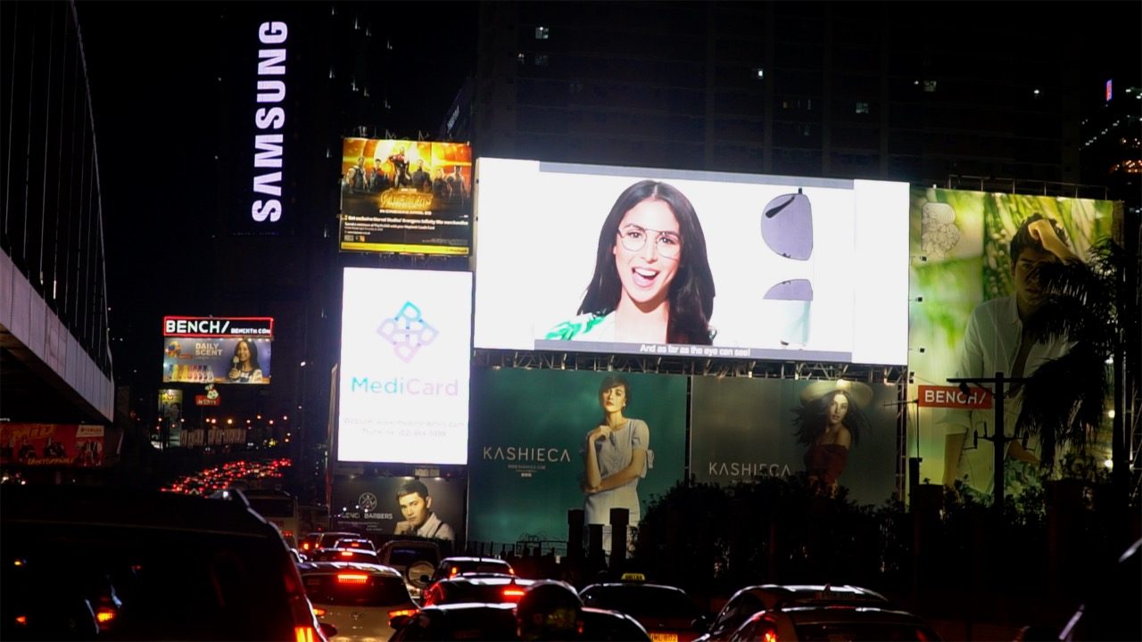 ATTENTION. Electronic billboards outshine regular billboards at night, distracting some drivers. Photo by Naoki Mengua/Rappler   