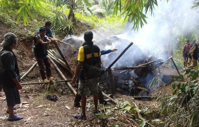 CRACK DOWN. Ipo Watershed forest guards discover an illegal charcoal oven inside the watershed. Photo from Fredd Ochavo/UP Mountaineers 