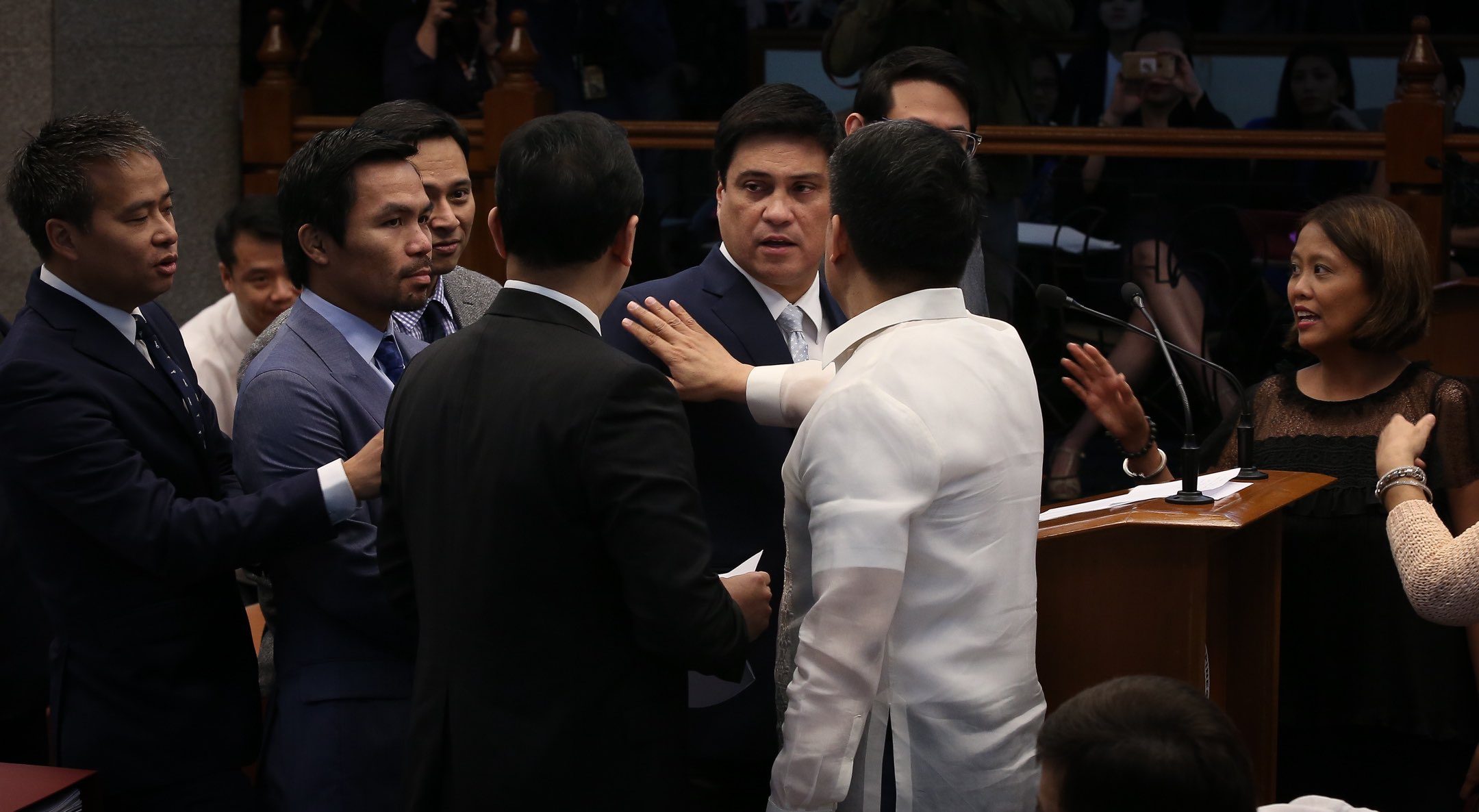 'WAR.' Senators try to pacify Senators Antonio Trillanes IV and Juan Miguel Zubiri who were caught in a heated word war on the Senate floor. Photo by Jun Aniceta  