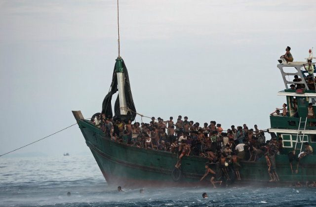 Indonesian police say Australia paid crew of asylum-seeker boat to turn back