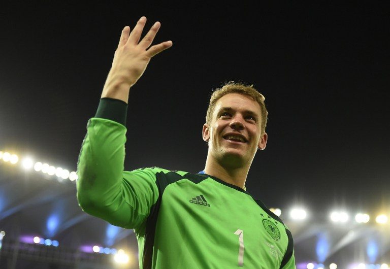 Manuel Neuer celebrates after Germany claims its fourth World Cup title beating Argentina in extra-time, 1-0. Photo by Fabrice Coffrini/AFP