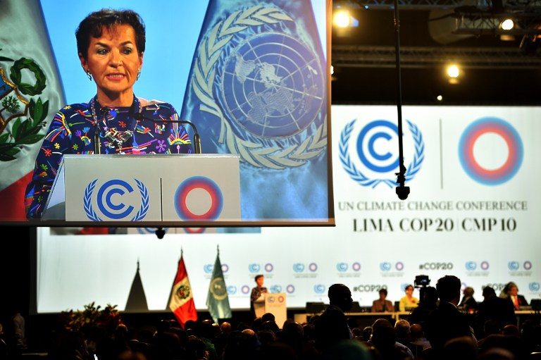 UNFCCC Executive Secretary Christiana Figueres, addresses the public during the Opening Ceremony of the UN COP20 and CMP10 conference in Lima, on December 01, 2014. Cris Bouroncle/AFP