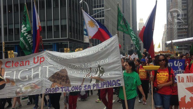 CLIMATE FRONT LINES. Filipino activists and domestic workers actively participate in the People's Climate March in New York. Photo by Ayee Macaraig/Rappler 