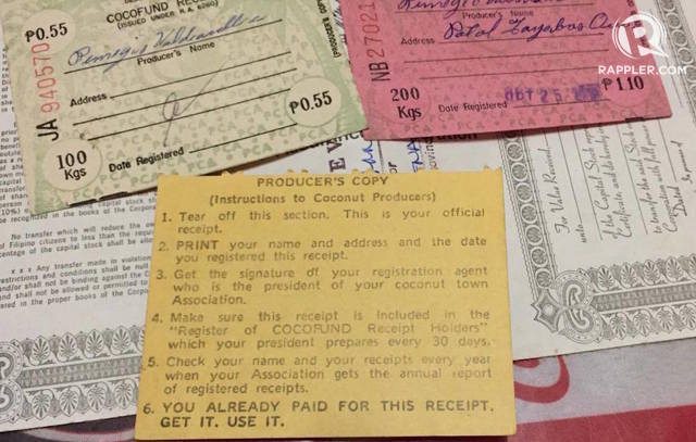 PROOF. A farmer from Quezon province kept documents showing they were taxed for their copra sales during the Marcos administration. File photo by Camille Elemia/Rappler  