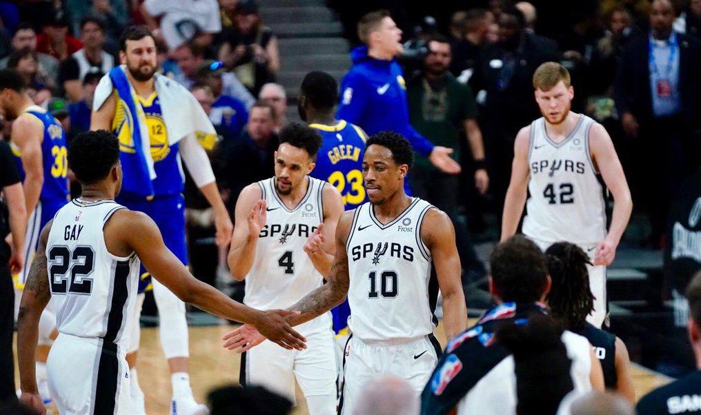Spurs roll on at Warriors’ expense as Nuggets clinch playoff spot