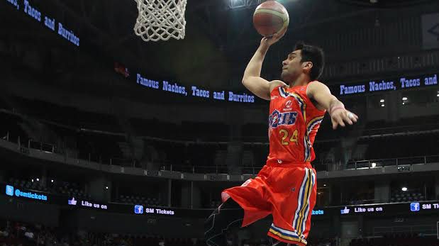 Rey Guevarra goes up for a dunk during the PBA dunk contest