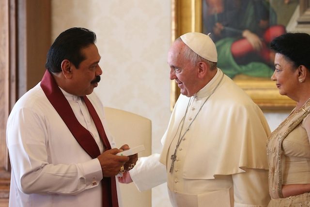 In this file photo, Pope Francis (C) greets Sri Lankan President Mahinda Rajapakse (L) and his wife Shiranthi (R) during a private meeting in Vatican City, 03 October 2014. Alessandro di Meo/EPA