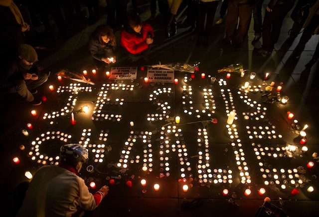 'JE SUIS CHARLIE.' Thousands gather for a candle light vigil on Place de la Republique in central Paris, hours after the attack by two gunmen on the 'Charly Hebdo' headquarters in Paris, France, 07 January 2015. Ian Langsdon/EPA