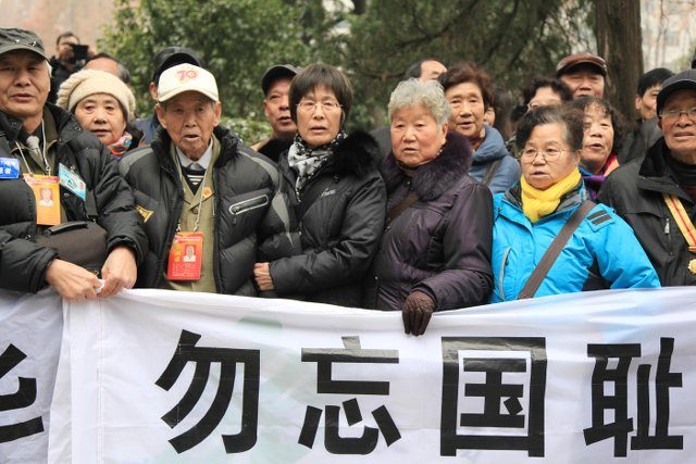 China commemorates Nanjing massacre in somber ceremony