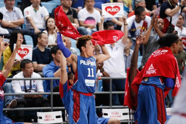 ROMEO TO THE FINALS. Terrence Romeo raises his towel late in the game against Japan. Photo from FIBA 