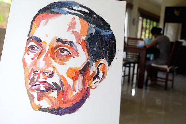 PORTRAIT. A painting by Bali Nine ringleader Myuran Sukumaran of President Jokowi Widodo, with the words on the back of the painting 'People can change'. Photo by EPA  