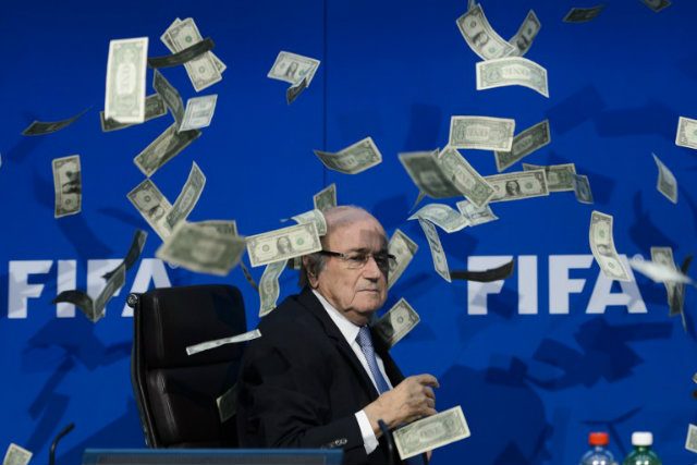 WATCH: British comedian showers FIFA president Blatter with cash