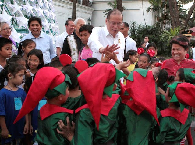 UNCLE PNOY. President Benigno Aquino III high-fives with children dressed as elves during the DSWD's Pasko ng Batang Pinoy Project at the Palace grounds on December 19, 2012. Photo by Gil Nartea/Malacañang Photo Bureau 