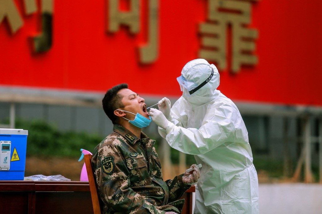 14% of virus patients discharged in China’s Guangdong re-test positive