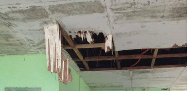 ESCAPE. Nurses broke the ceiling in the Leyte Provincial Hospital to give their patients a chance to escape the rising waters