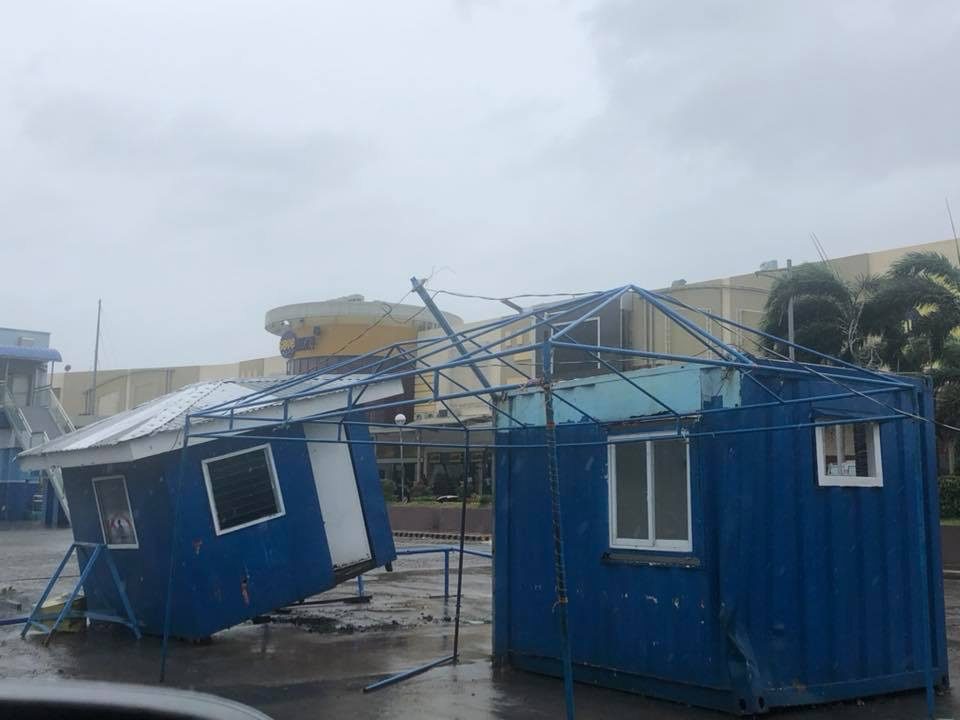 TILTED. Public order and safety sheds in Ilagan City became tilted as Typhoon Rosita battered Isabela. Photo by Fr Grevie Uanan 