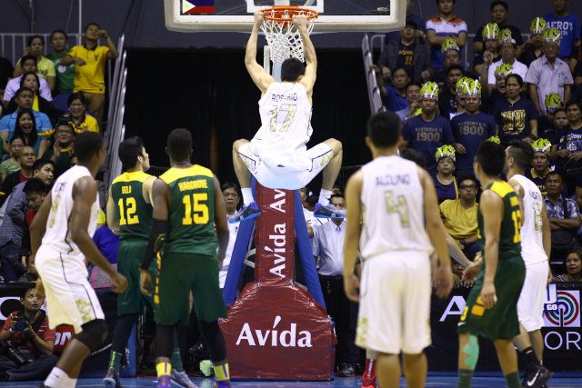 Troy Rosario of National University throws down a dunk. Photo by Josh Albelda/Rappler