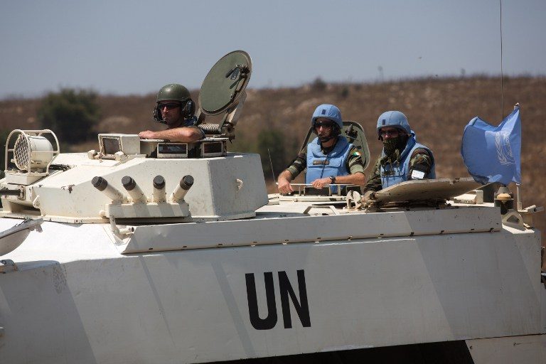 Under U.S. pressure, UN agrees deep cuts to peacekeeping