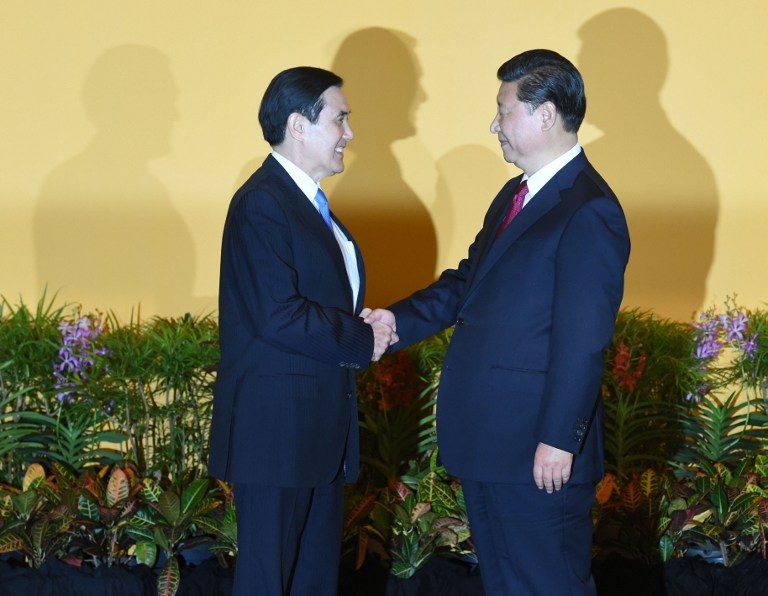 China, Taiwan leaders open summit with historic handshake