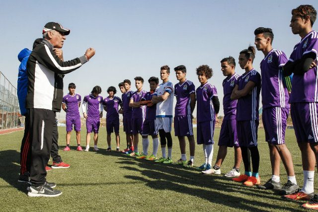 Voiceless Iraqi coach inspires footballers