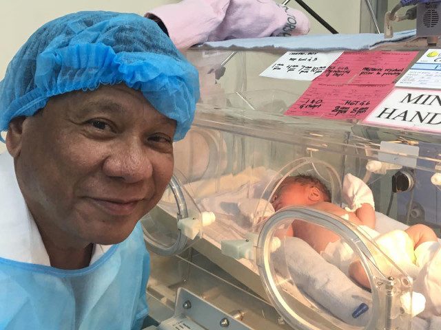 Tired but happy Duterte meets grandson Stonefish