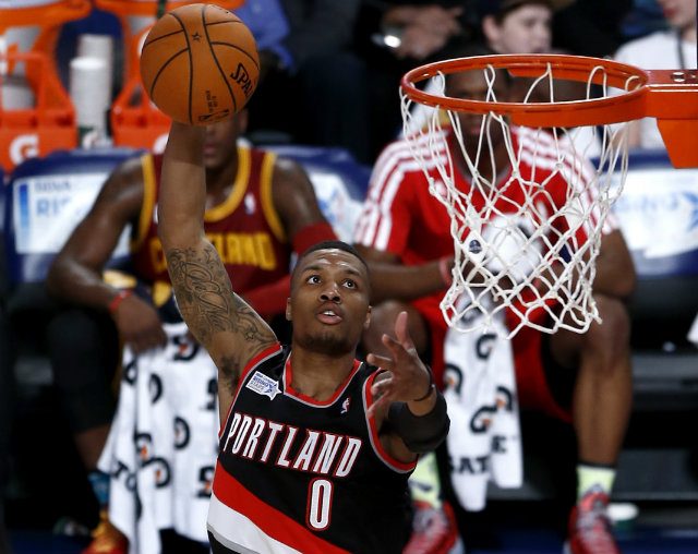 Damian Lillard joins LaMarcus Aldridge as one of only three tandems to average more than 20 points a game. Photo by Larry W. Smith/EPA