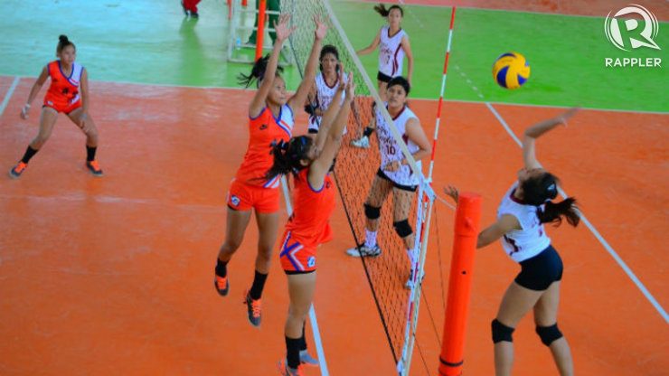 A Davao secondary volleyball player prepares to spike during a game against Northern Mindanao. Photo by Jerome Monta/Rappler