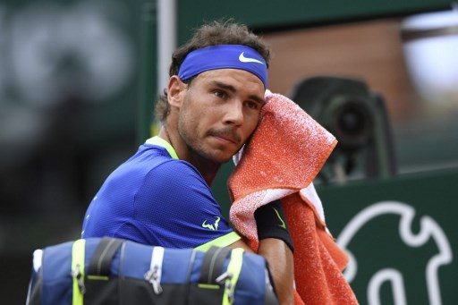 Nadal merciless as Djokovic toils in Paris