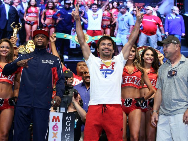 IN PHOTOS: Pacquiao, Mayweather make weight