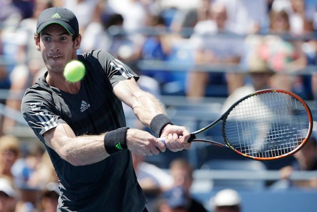 Andy Murray hits a return to Robin Haase during the 2014 US Open Tennis Championship at the USTA National Tennis Center in Flushing, Meadows, New York, USA, 25 August 2014. Jason Szenes/EPA