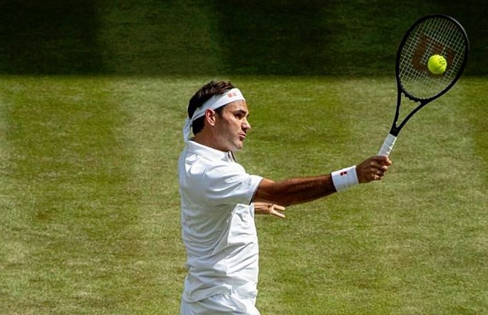 Federer posts new Slam record as favorites cruise into Wimbledon last 16