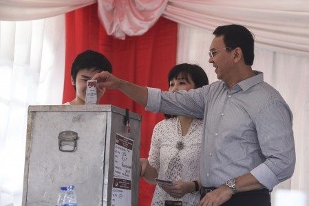 Jakarta votes for governor amid religious tension
