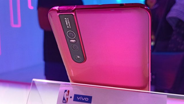 V15 PRO. The Pro variant in coral red. Photo by Gelo Gonzales/Rappler 