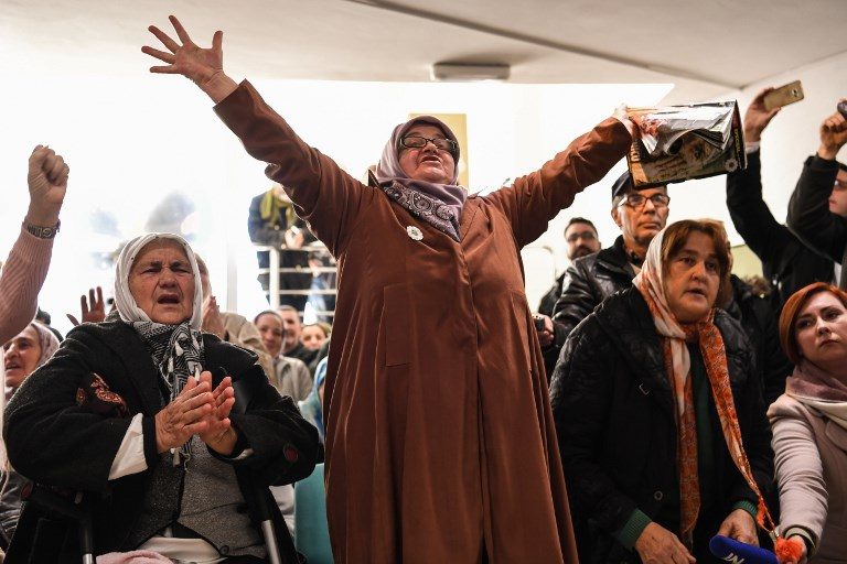 CELEBRATION. People celebrate as they watch a live TV broadcast from the International Criminal Tribunal for the former Yugoslavia (ICTY) on November 22, 2017 in Srebrenica, when UN judges announce the life sentence in the trial of former Bosnian Serbian commander Ratko Mladic. Photo by Dimitar Dilkoff/ AFP 
