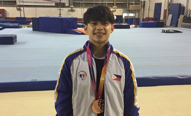 Teen gymnast Carlos Yulo finds winning rhythm in Olympic quest