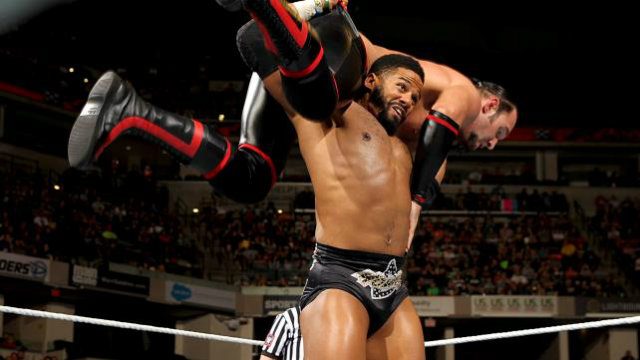 Darren Young lifts Viktor of The Ascension in a Fireman's Carry during a recent match. Photo from WWE.com 