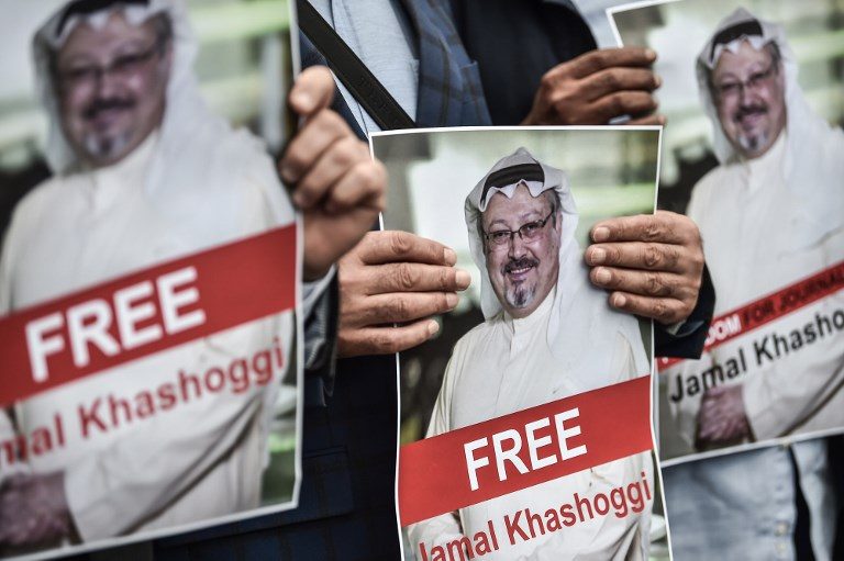STILL MISSING. Protestors hold pictures of missing journalist Jamal Khashoggi during a demonstration in front of the Saudi Arabian consulate in Istanbul. File photo by Ozan Kose/AFP  