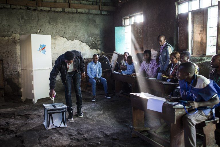 Volatile DR Congo votes after two-year delay