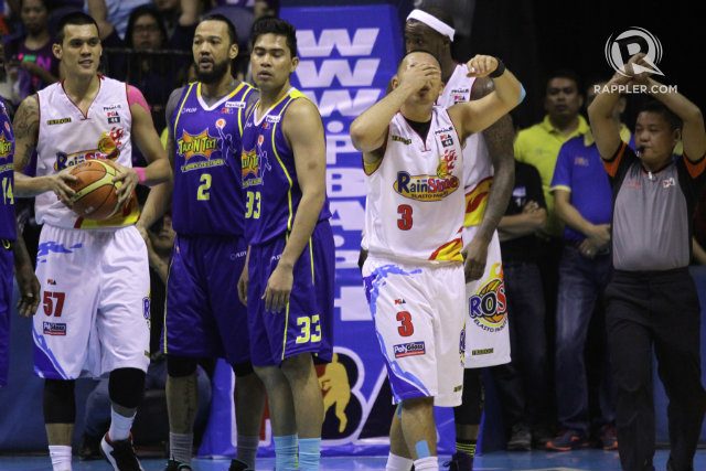 Rain or Shine guard Paul Lee holds on to his face after getting hit hard by Ivan Johnson. Photo by Josh Albelda/Rappler 